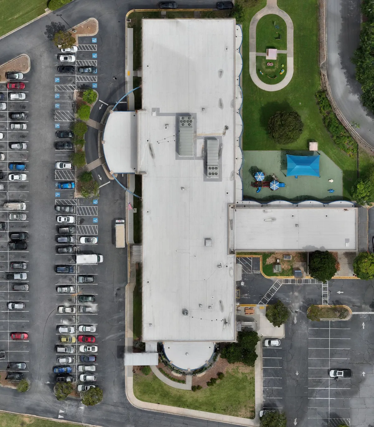 Full drone orthomosaic of a commercial roof and surrounding site